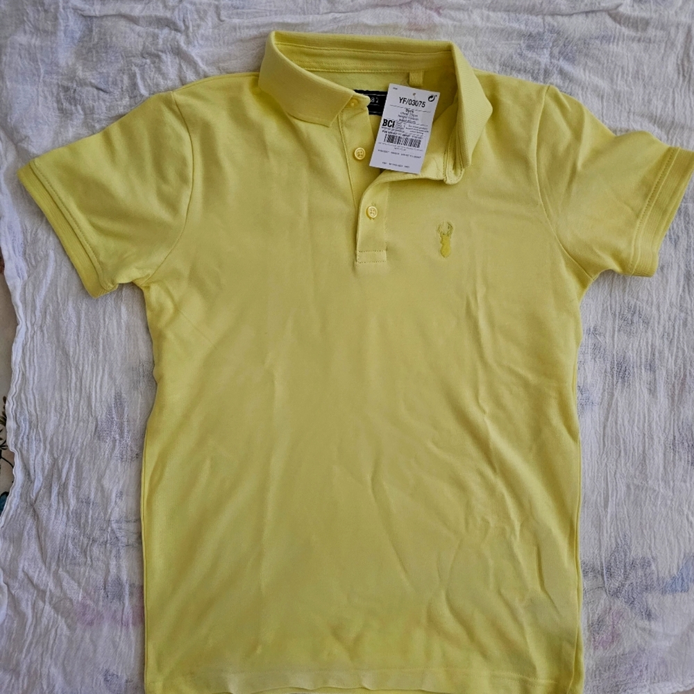 Next Direct Boys yellow polo shirt. Size 9 brand new.